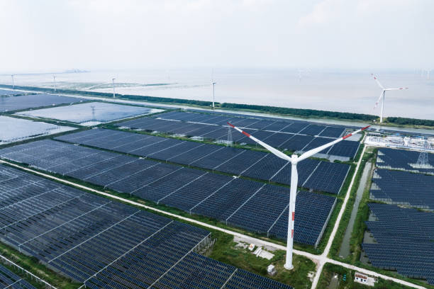 istock solar power station and wind power station 2169746043