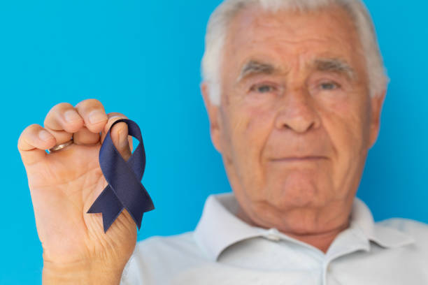 istock Senior Man Showing Blue Awareness Ribbon 2169748846