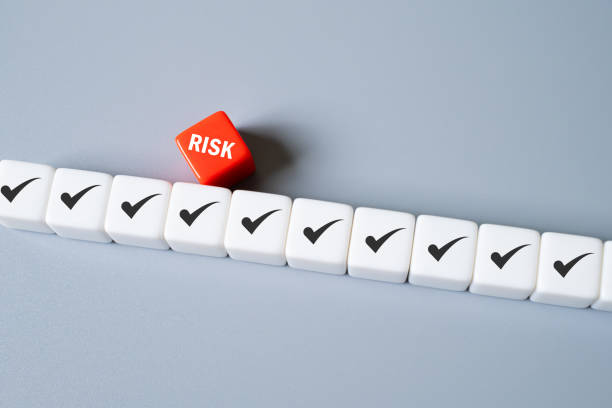 istock close up at the red cube to identify red danger risk cube among other normal incident. Risk management concept for business and personal planning for risk mitigation. 2169752599