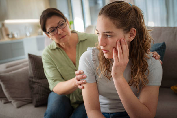 istock Mother supporting her distraught and worried daughter 2169755046