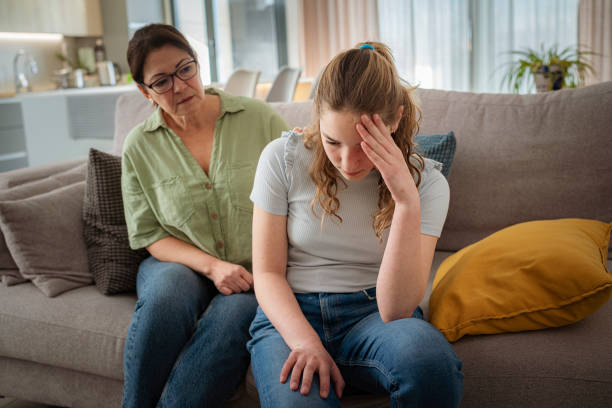 istock Mother consoling her distraught adolescent daughter 2169755067