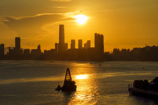 A yacht crossing the Victoria Harbour in Hong Kong
