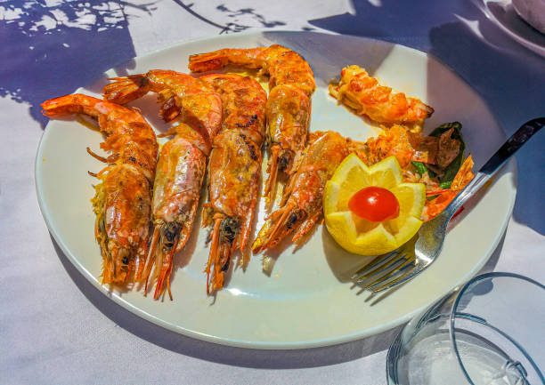 Italian lunch entree of fried prawns (with the heads still attached in the European style)