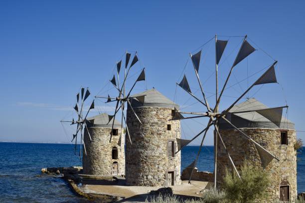 istock historic old windmills in chios island, greece 2169758674