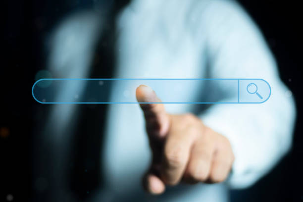istock Person touching search bar on virtual screen. Search bar internet data browser. SEO search engine optimization concept. Marketing ranking traffic website, internet technology for business company. 2169760738