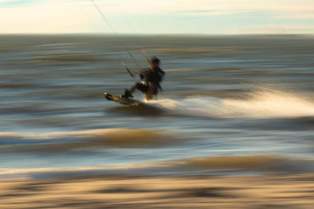 Izmir, Türkiye-08/01/2023: Large group of people practicing kiteboarding.