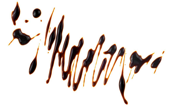 istock Liquid chocolate sauce isolated on a white background, top view. Melted chocolate cream. 2169764836