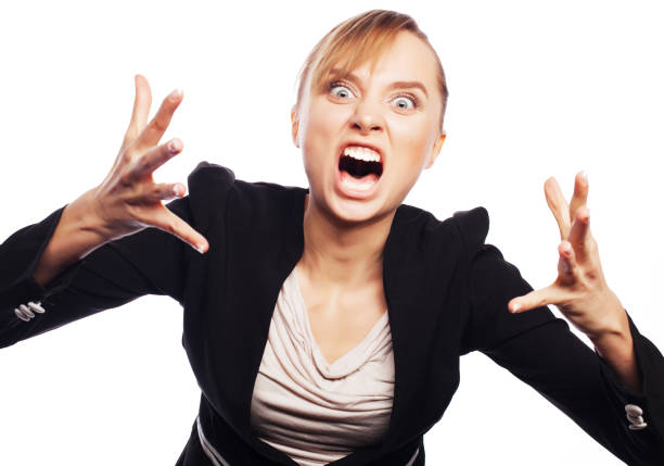 Stress and fatigue: angry screaming businesswoman. Isolated on white.