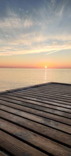 istock Sunrise from the pier 2169768479