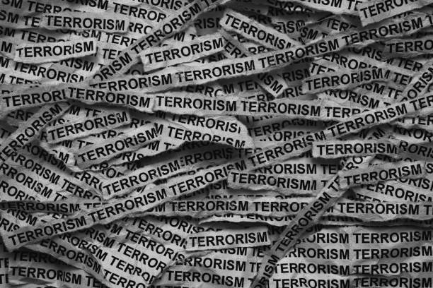 istock Strips of newspaper with the words Terrorism typed on them 2169768720