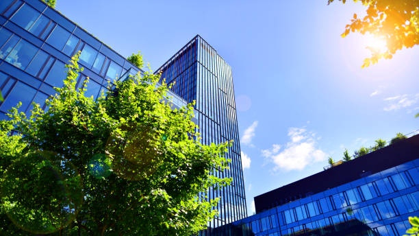 istock Sustainable glass office building with trees for reducing carbon dioxide. 2169768812