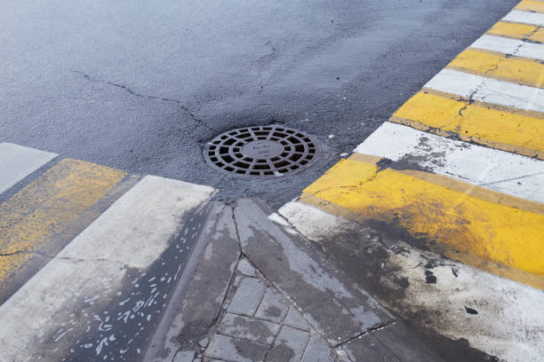 istock pedestrian crossing, white and yellow stripes 2169777120