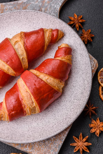 istock Delicious fresh crispy croissants with chocolate filling 2169778271