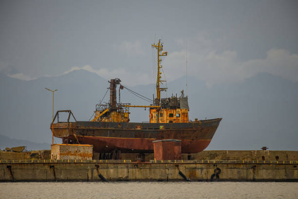 istock An old small boat stands on dry land 2169783115