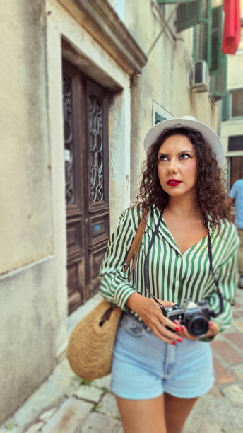 istock Tourist Wandering In The Old Town 2169789699