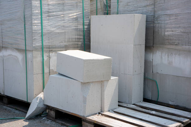 istock Pallet of Concrete Cinder Blocks, Grey Uniformed brick Shapes building material. 2169796148
