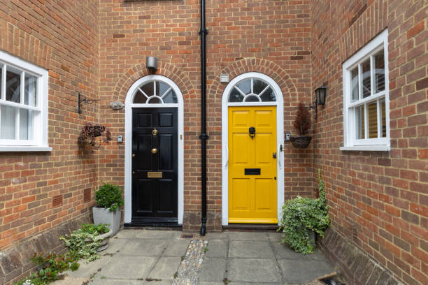 istock Two side-by-side Georgian entry doors 2169801044