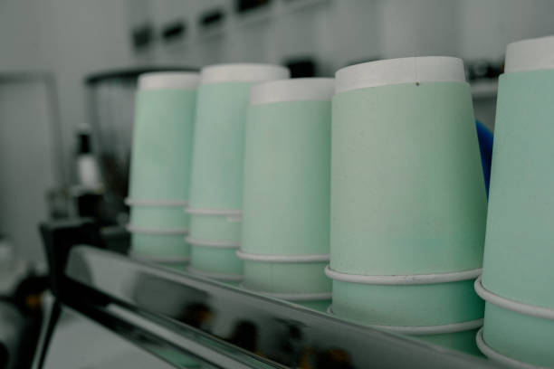 istock Lovely coffee glasses are standing on the coffee machine. 2169813712