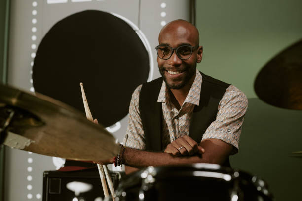 istock Young Black Drummer Smiling At Camera 2169814026