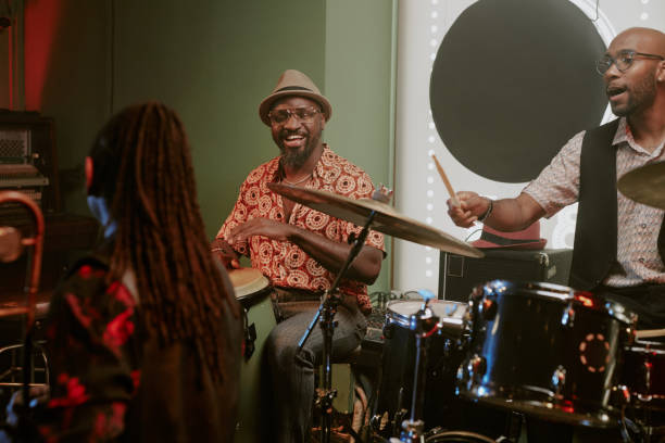 istock Cheerful Male Musicians On Stage In Bar 2169814971