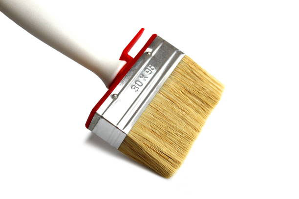 The paint brush is on a white isolated background.