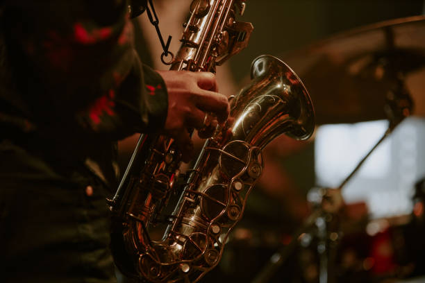 istock Unrecognizable Black Saxophonist Playing On Stage 2169815639