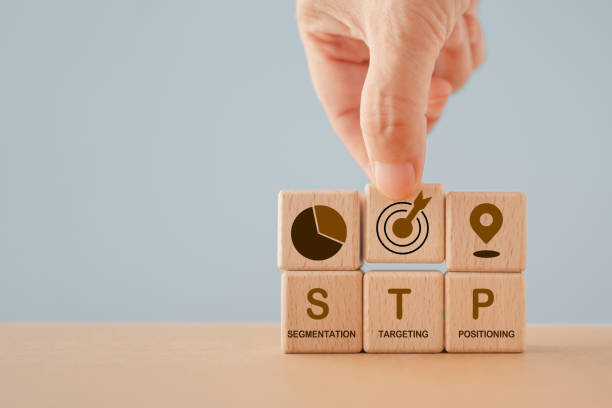 istock STP text ,abbreviation for Segmentation, Targeting, Positioning, and icon on wooden cube blocks. For marketing analysis, customer target, customer 2169817566