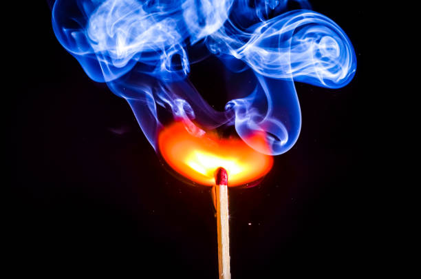 A single burning stick of Palo Santo Holy wood or sacred wood - Bursera graveolens, used to aid mediatation.