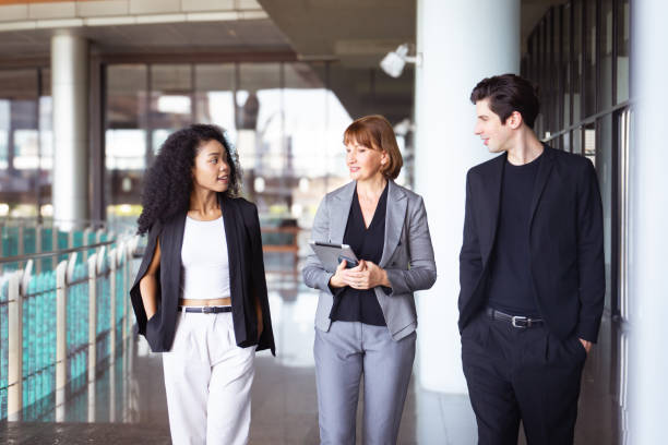 istock Group of businesspeople taking together inside the building. 2169819980