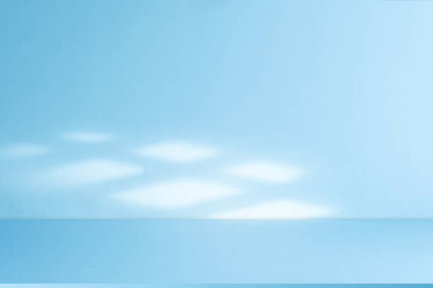 istock Studio style background wall decoration presentation uses white and blue tones. with shadows cast from a nearby window, concept creating a decorative 2169820069