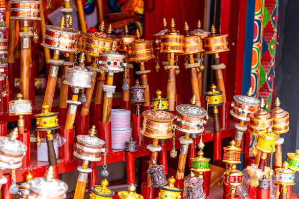 istock Prayer wheels at flea market in Lhasa, Tibet 2169820586