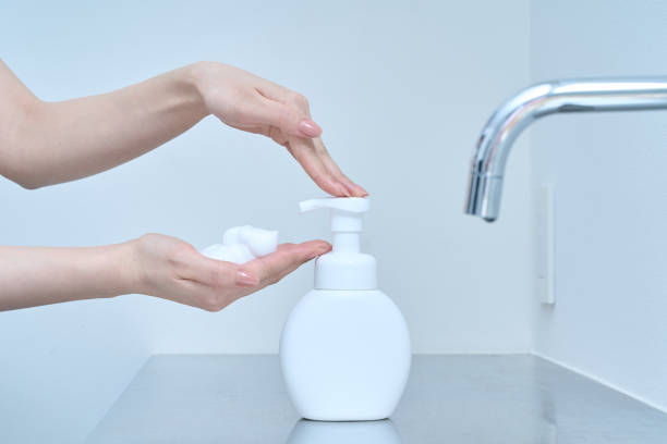 istock A woman washing her hands with hand soap 2169821266