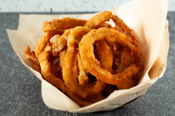 istock basket of onion rings 2169821606