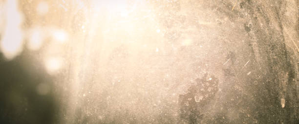 istock blur abstract glass window with sunlight. blur glass with yellow light 2169825793