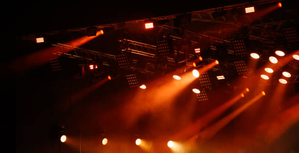 istock Red-orange color on stage at a concert 2169826403