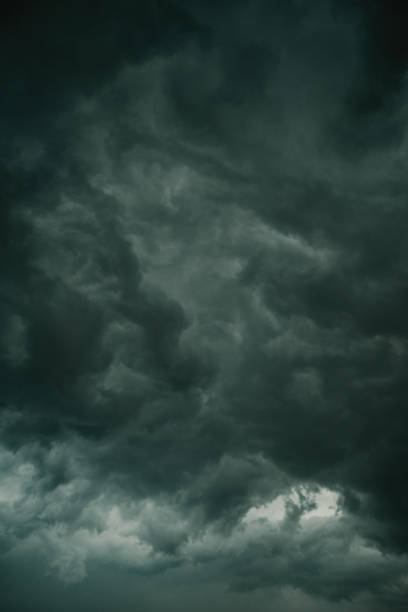 istock Ominous dark supercell stormy clouds in summer 2169826711