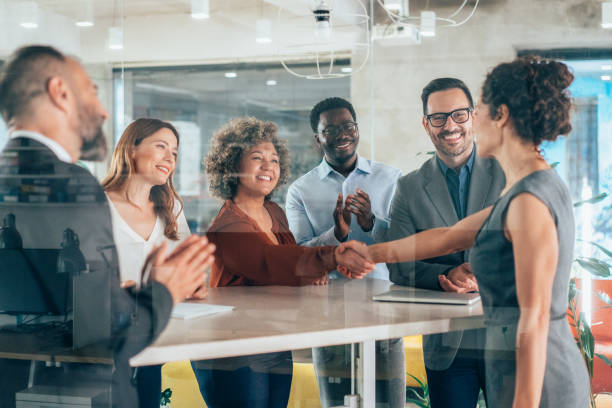istock Shaking hands with new colleague 2169827285