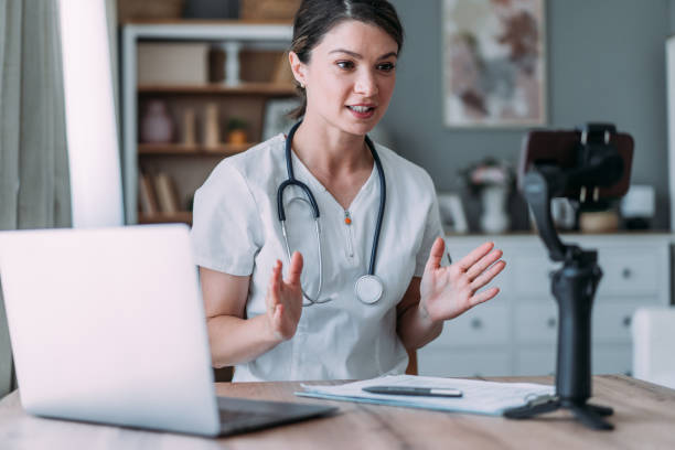 istock Doctor making online live streaming broadcast. 2169836746