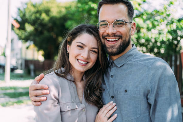 istock Happy couple hugging outdoors. 2169836774