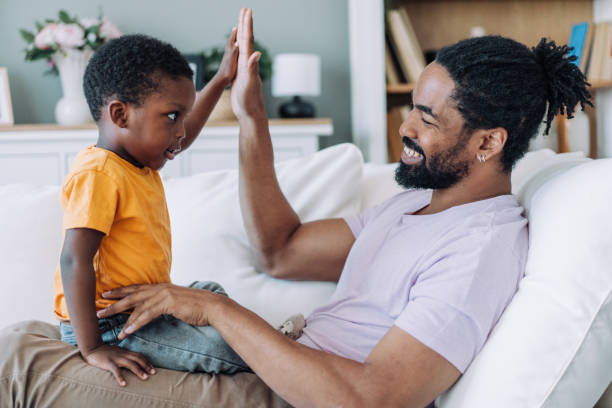 istock Father and little son at home. 2169836825