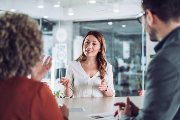 istock Confident female applicant talking at job interview answering questions. 2169837358
