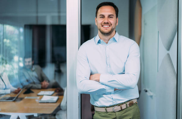 istock Confident businessman and his team. 2169837706
