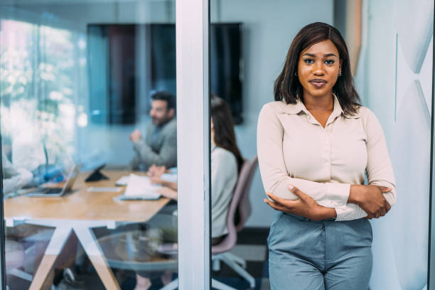 istock Confident businesswoman and her team. 2169837715