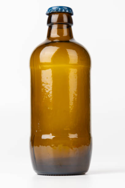istock Brown Beer Bottle in Vertical Position with Clean White Background 2169842749