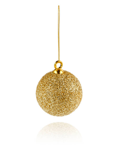 Golden glittering Christmas bauble ornaments isolated on white background with clipping path.