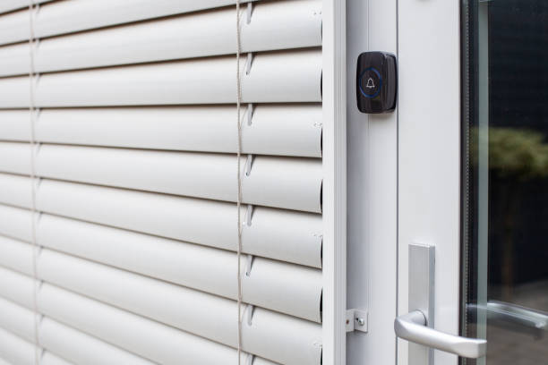 istock Closed Window Blinds with Doorbell on a Modern Door 2169847894