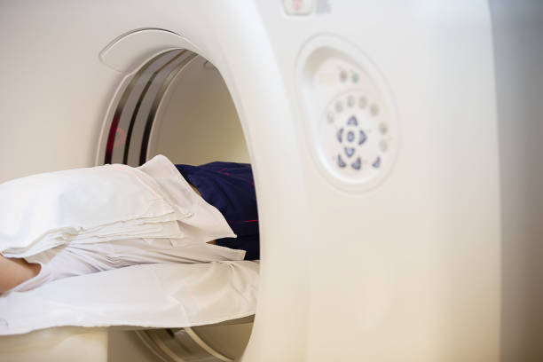 istock Part of an MRI machine with an unrecognizable patient 2169859213