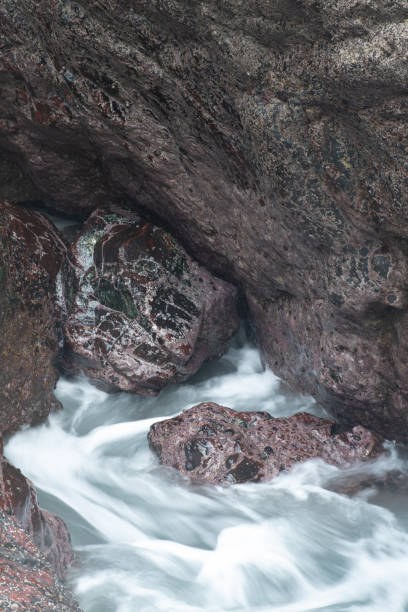 istock A serpentine boulder at  Kynance Cove Cornwall 2169864263