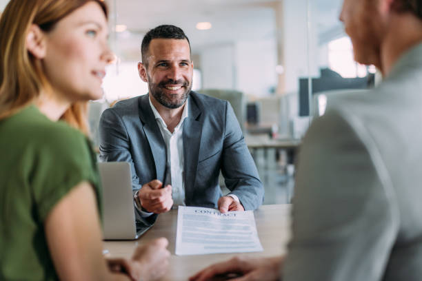 istock Business people signing a contract in the office. 2169865731