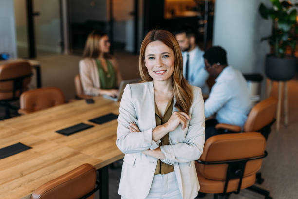 istock Confident businesswoman and her team. 2169869899